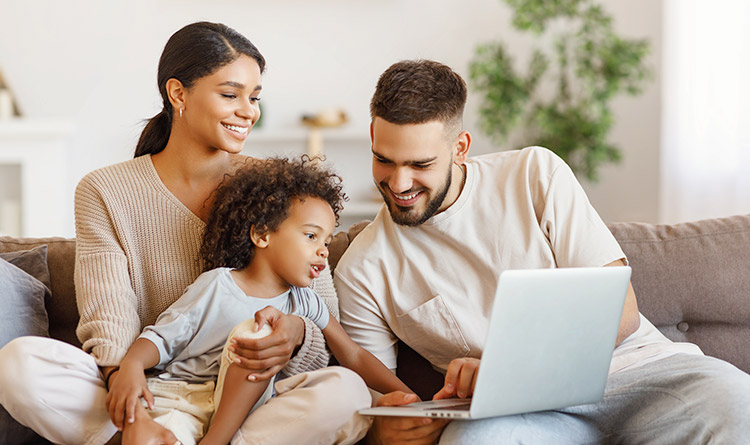 Family-using-laptop Family using laptop
